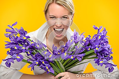 Woman with spring iris flower roar Stock Photo