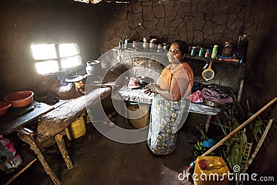 Woman in Sri Lanka in a poor kitchen. Editorial Stock Photo