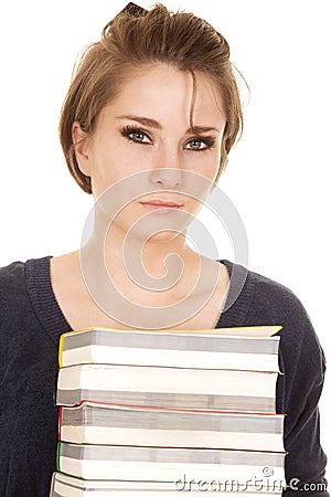 Woman stack of books holding very serious Stock Photo