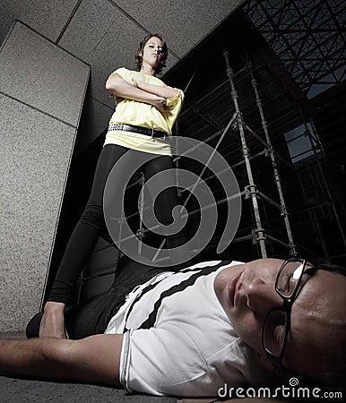 https://thumbs.dreamstime.com/x/woman-standing-over-defeated-man-10838934.jpg