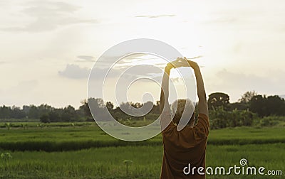 Woman standing for relax in the evening with sunset in nature outdoor Editorial Stock Photo