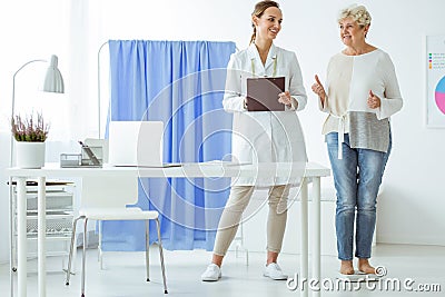 Woman standing on scales Stock Photo
