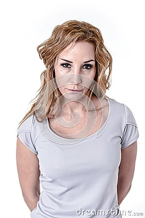 Woman staring intense with angry and defiant eyes in disappoint face expression Stock Photo