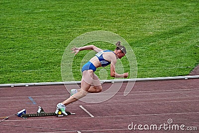 Athlete at the start of 200m race Editorial Stock Photo