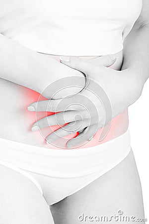 Woman with stomachache or menstrual red pain area on white Stock Photo