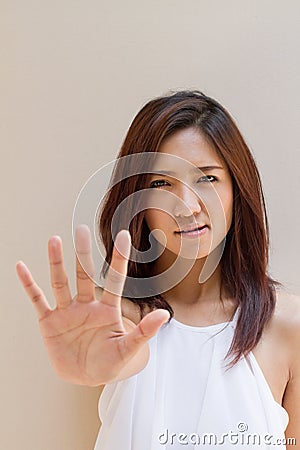 Woman with stop, reject, refuse, forbid, negative hand sign Stock Photo