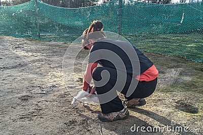 Woman stroking a rabbit. Nature love and vegan concept Stock Photo