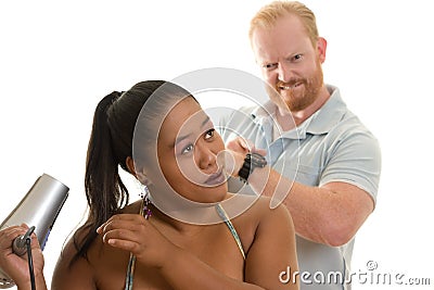 Woman styling hair in hurry Stock Photo