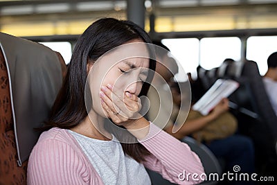 Woman suffer from seasick on boat Stock Photo
