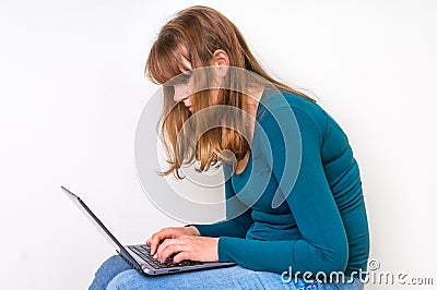 Woman is suffering from back pain - bad posture concept Stock Photo