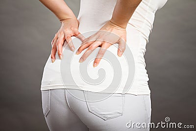 Woman suffering from back pain Stock Photo