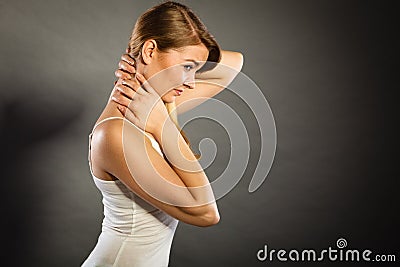 Woman suffering from neck pain Stock Photo