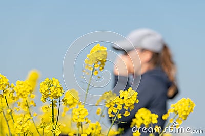 woman suffering from pollen allergy while training outdoors Stock Photo