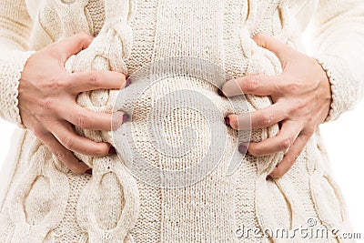 Woman suffering stomachache grabbing her tummy Stock Photo