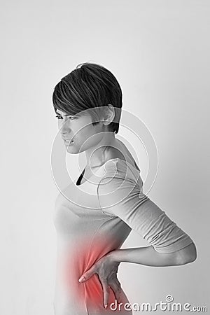 Woman suffers from back pain, concept of office syndrome Stock Photo