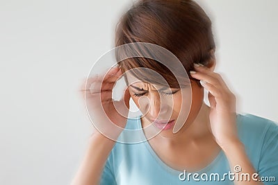 Woman suffers from pain, headache, sickness, migraine, stress Stock Photo