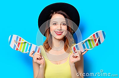 Woman with summer flip-flops Stock Photo