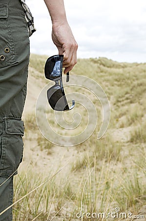 Woman with sun glasses on vacation Stock Photo