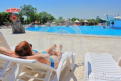 Woman in sunglasses standing near the small Hagia Sophia mosque in the Istanbul park of miniature Editorial Stock Photo