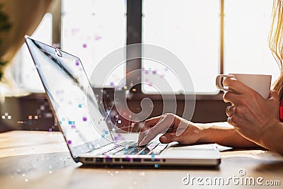 Woman surfs in internet with her laptop. She work at home as smart working Stock Photo