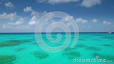 Woman swimming in crystal turquoise sea water Stock Photo