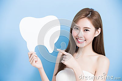 Woman take cute tooth Stock Photo