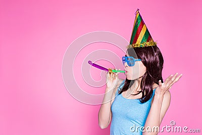 Woman take noisemaker Stock Photo