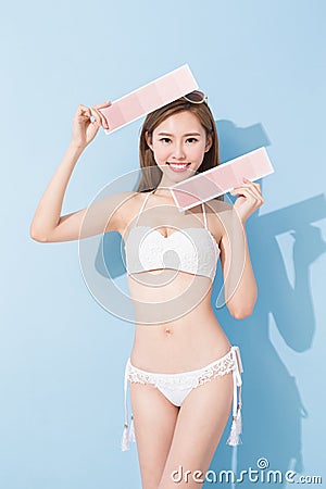 Woman take skin color scale Stock Photo