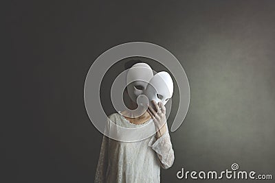 Woman takes off the mask from her face but underneath her she has another mask, concept of hiding one`s soul and oneself Stock Photo