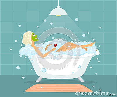 Woman taking a bubble bath in a vintage bathtub Stock Photo