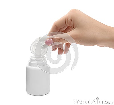 Woman taking chewing gum pieces from jar on white background, closeup Stock Photo