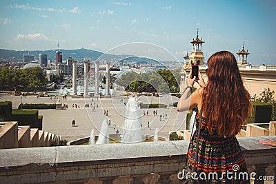 Woman taking the photo panorama mountain in Barcelona Stock Photo