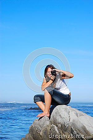 Woman taking pictures Stock Photo