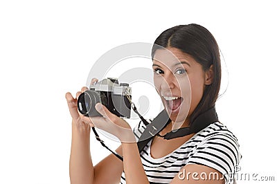 Woman taking pictures posing smiling happy using cool retro and vintage photo camera Stock Photo