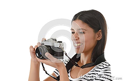 Woman taking pictures posing smiling happy using cool retro and vintage photo camera Stock Photo