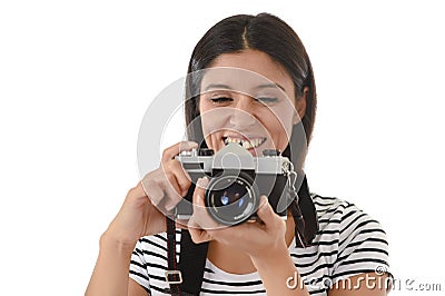 Woman taking pictures posing smiling happy using cool retro and vintage photo camera Stock Photo