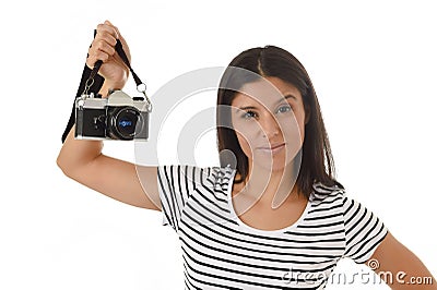 Woman taking pictures posing smiling happy using cool retro and vintage photo camera Stock Photo