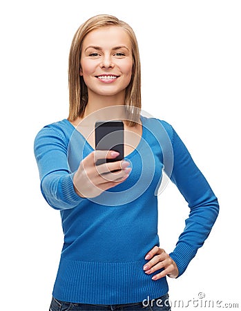 Woman taking self picture with smartphone camera Stock Photo