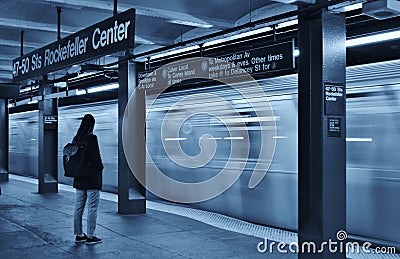 Woman Taking the Subway New York City MTA Train Black and White Background Editorial Stock Photo