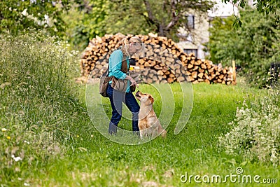 Woman talk to her Dog Stock Photo