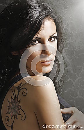 Woman with tatoo Stock Photo