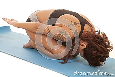 Woman tattoos childs pose arms back Stock Photo