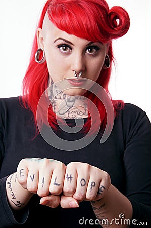Woman with tattoos and piercings Stock Photo
