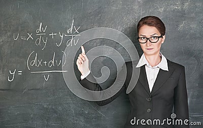 Woman teacher teaching maths Stock Photo