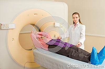 Woman Technologist testing patient Stock Photo