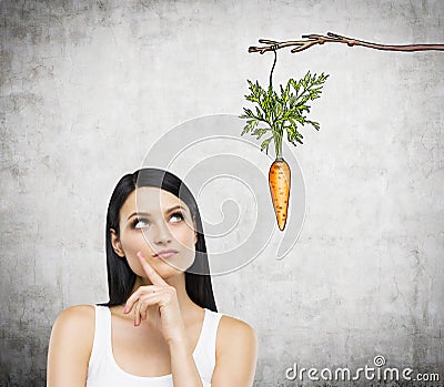 Woman thinking about reward Stock Photo