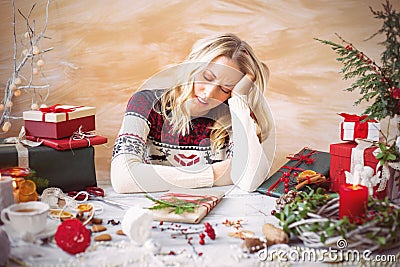 Woman tired of gift wrapping Stock Photo