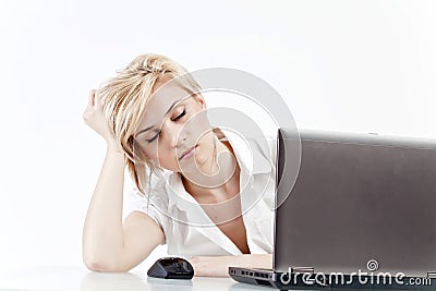 Woman tired at work Stock Photo