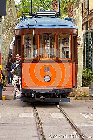 Woman 30 to 45 Waits At The Door to Exit Of The Train Coming From Majorca Editorial Stock Photo