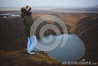 Woman on Top of Iceland Volcano Hill Stock Photo